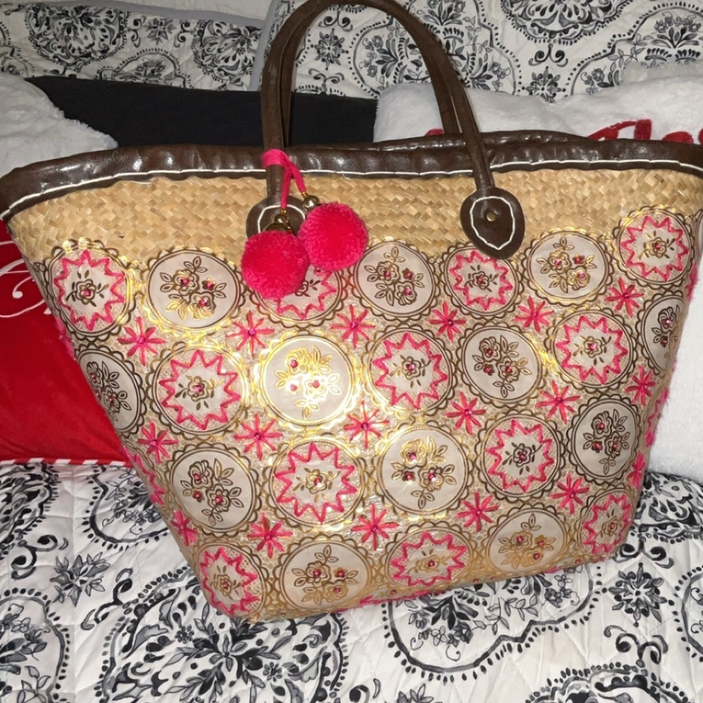 limited edition embroidered and weaved satchel bag.